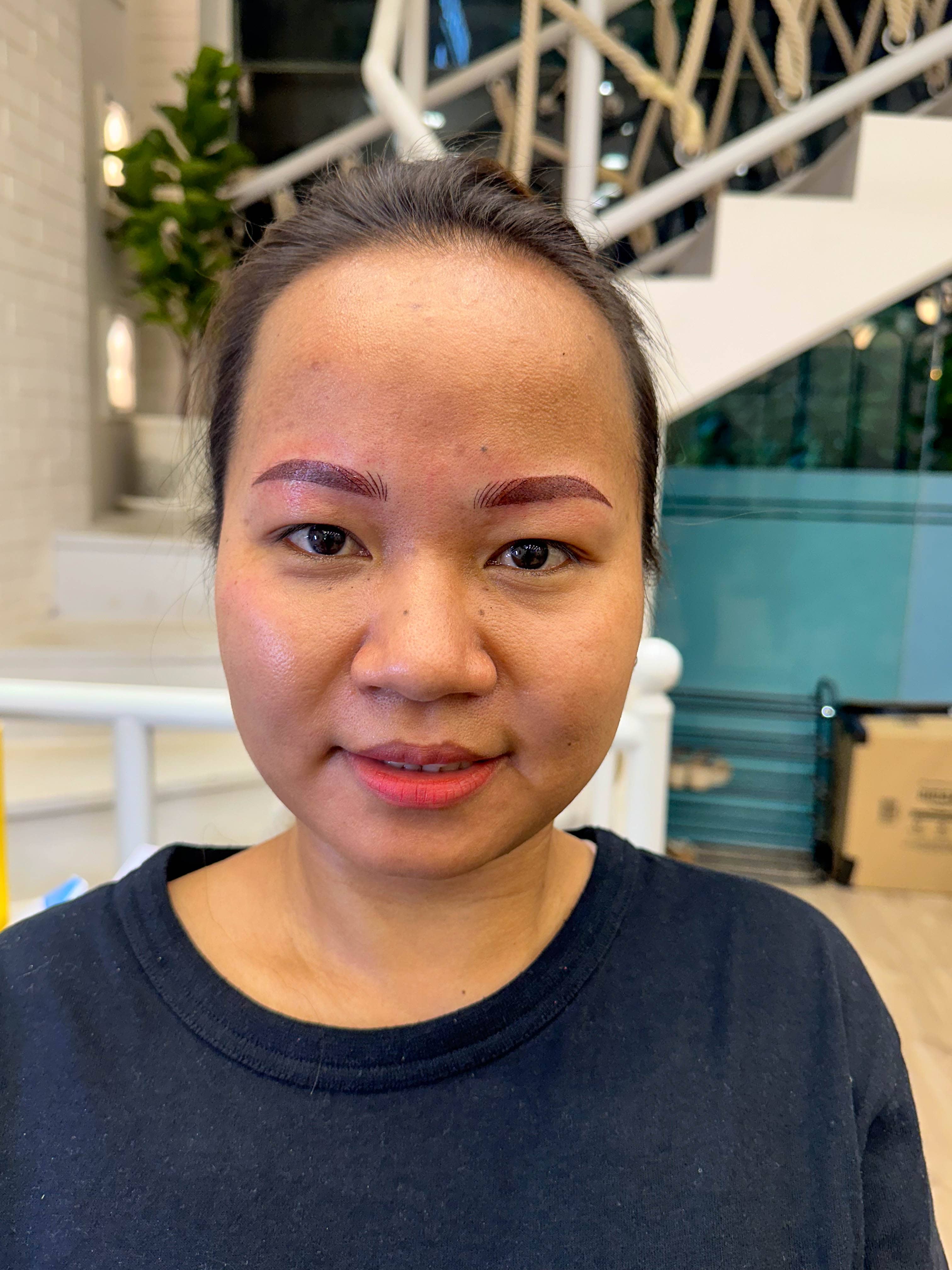 Close-up of perfectly healed lip blush tattoo